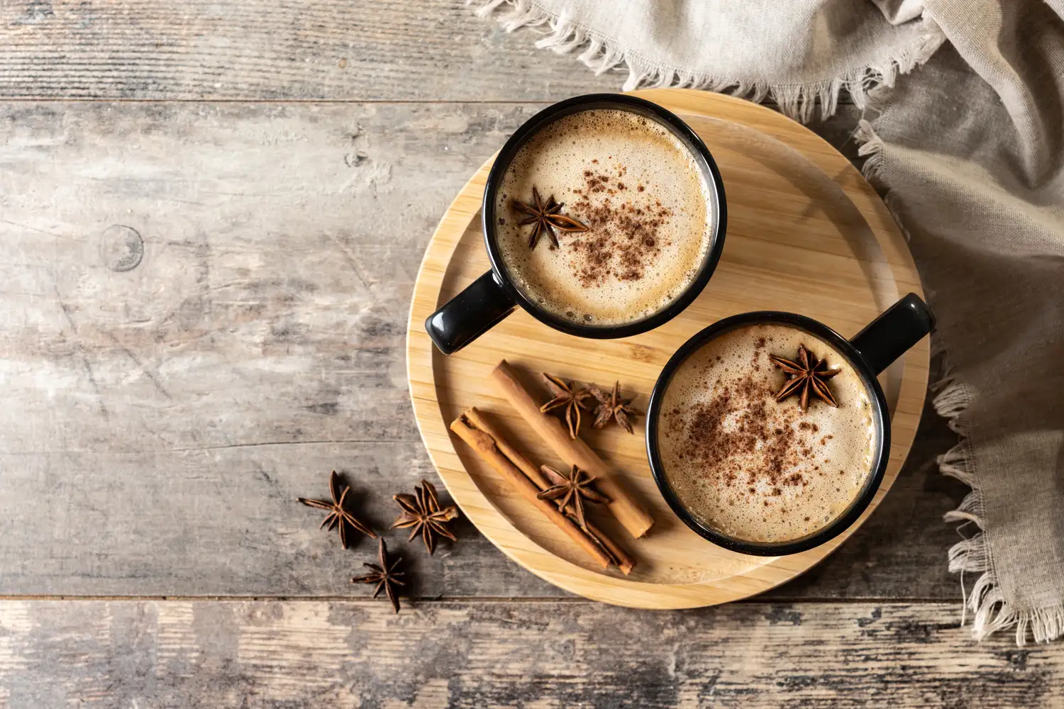 Chai lattes on a wooden board