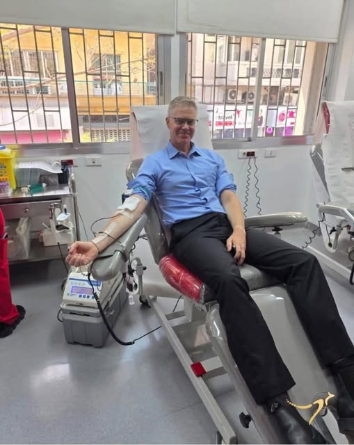 May be an image of hospital and text