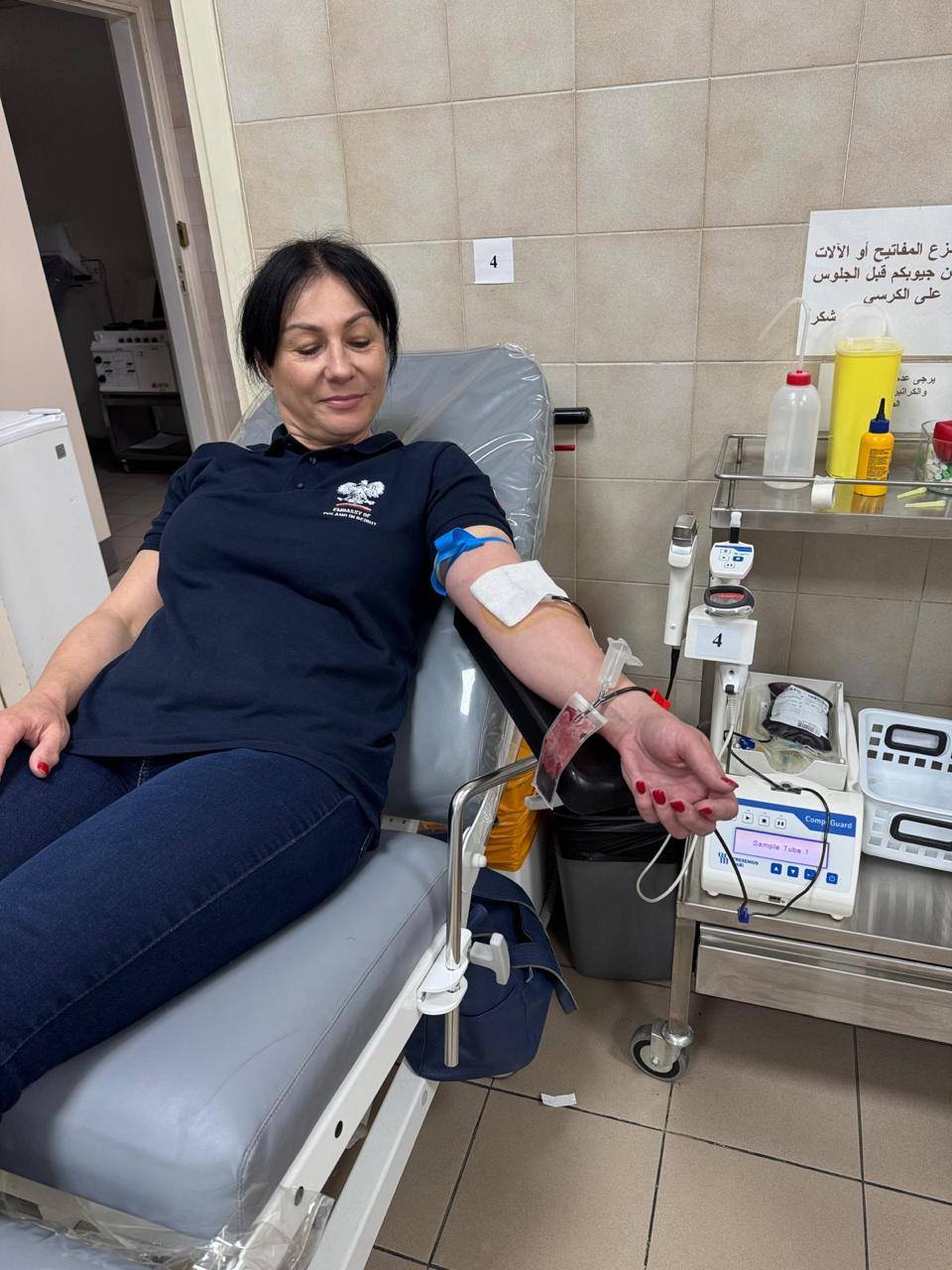 May be an image of hospital and text