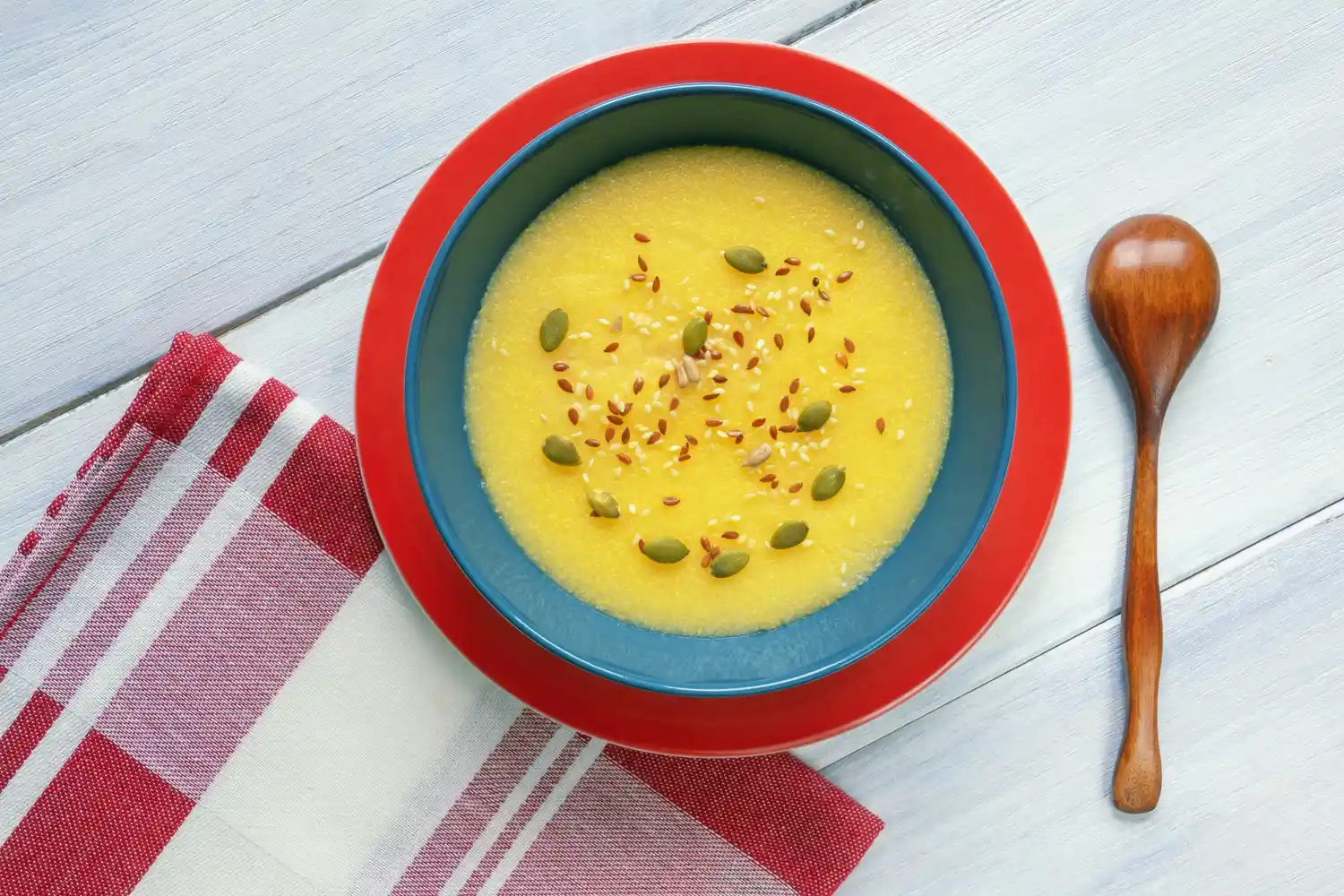 An image of cornmeal porridge with sunflower seeds