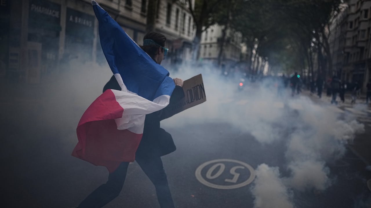 Tens of thousands march in France as protests continue over schools and living costs | CBC News